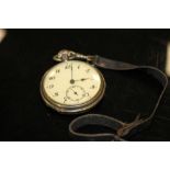 A VINTAGE GENTS POCKET WATCH ON LEATHER STRAP