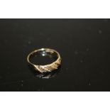 A LADIES 9CT GOLD ROPE WRAP EFFECT RING