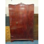 A MAHOGANY SINGLE DOOR WARDROBE