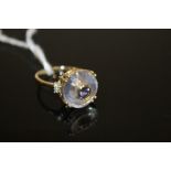 A HALLMARKED 9K GOLD LAVENDER QUARTZ TANZANITE AND DIAMOND RING, the lavender quartz is approx 6.