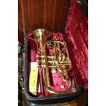 A CASED LARK BRASS TRUMPET