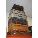 SEVEN ASSORTED VINTAGE SUITCASES TO INCLUDE LEATHER EFFECT EXAMPLES