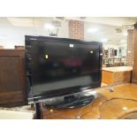 A TOSHIBA 31" FLATSCREEN TV