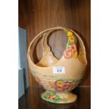 AN ARTHUR WOODS CERAMIC BASKET