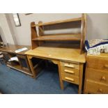 A LIGHT OAK SINGLE PEDESTAL DESK TOGETHER WITH TWO SHELVES (3)