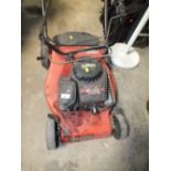 A PETROL CHAMPION LAWNMOWER WITHOUT BOX