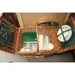 A WICKER PICNIC HAMPER CONTAINING CHURCHILL CHINA TOGETHER WITH A BOX OF CHURCHILL CHINA