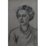 A 20TH CENTURY PORTRAIT STUDY OF A YOUNG WOMAN, indistinctly signed and dated lower left, charcoal