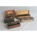 A COLLECTION OF MAGIC LANTERN SLIDES in five wooden boxes, mixed subjects