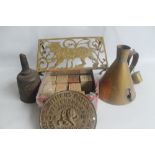 AN S. WITHERS' BRASS SAFE PLATE, A BRASS 'TIGER' TRIVET, A PORTABLE WELLS ENGINEER OIL LAMP NO.4A, a