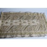 AN ANTIQUE MIDDLE EASTERN DOWRY TYPE SHAWL / SCARF, DECORATED WITH HEAVY GILT AND WHITE METAL THREAD