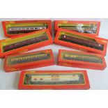 A COLLECTION OF 30 BOXED TRIANG HORNBY 'OO' GAUGE CARRIAGES AND ROLLING STOCK (red/yellow boxes)