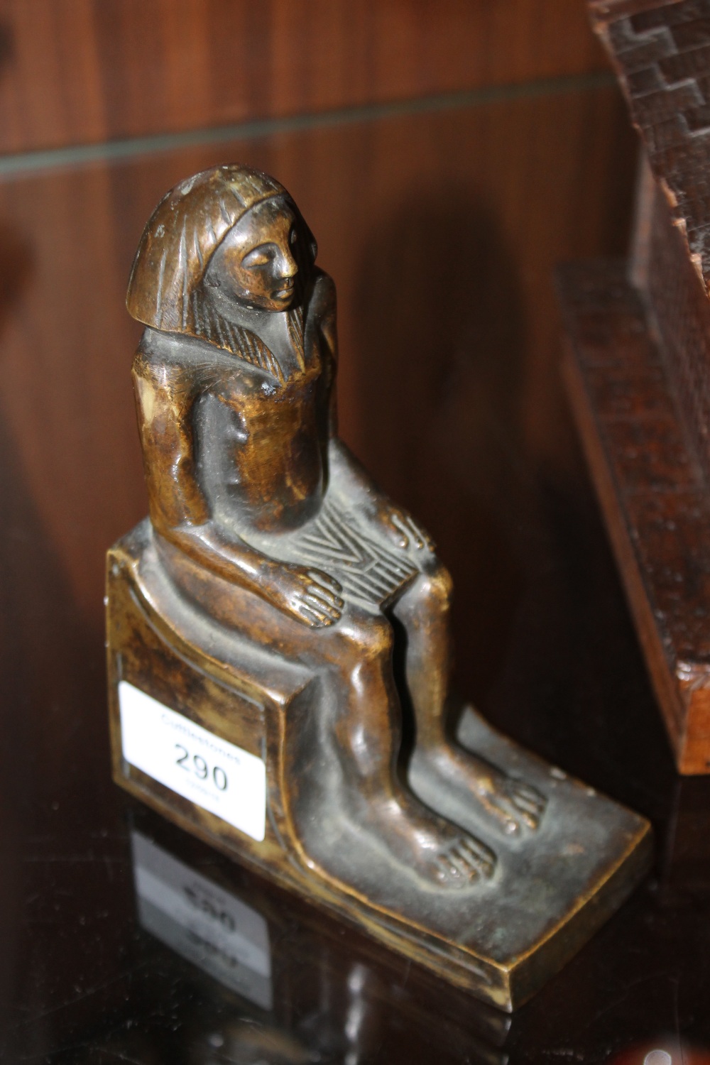 A BRONZE TYPE DESK MODEL OF AN EGYPTIAN PHARAOH, H 14 cm