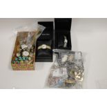 A BAG OF ASSORTED SILVER AND COSTUME JEWELLERY AND WRISTWATCHES