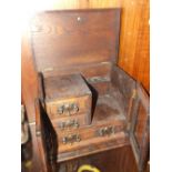 A VINTAGE OAK SMOKERS CABINET WITH ART NOUVEAU COPPER HANDLES