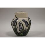 A SMALL MOORCROFT GINGER JAR WITH MATCHED LID