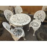 A CAST PAINTED WHITE GARDEN TABLE WITH FOUR CHAIRS