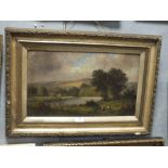 A GILT FRAMED VICTORIAN TYPE OIL ON CANVAS DEPICTING FIGURES IN A RIVER LANDSCAPE