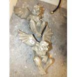 A PAIR OF WALL HANGING WINGED GARGOYLE FIGURES