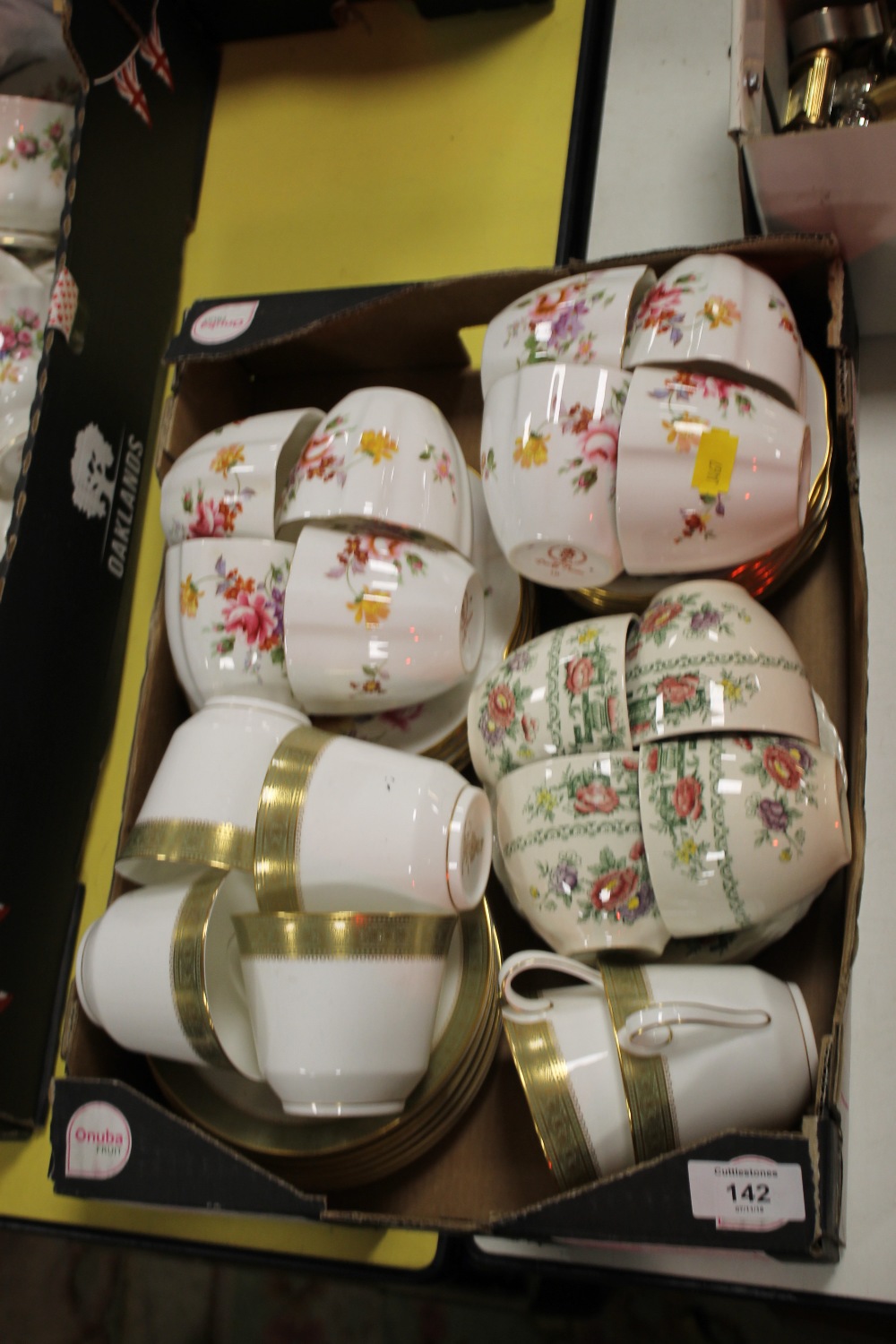 A TRAY OF CUPS AND SAUCERS COMPRISING OF ROYAL CROWN DERBY, ROYAL DOULTON AND CROWN DUCAL