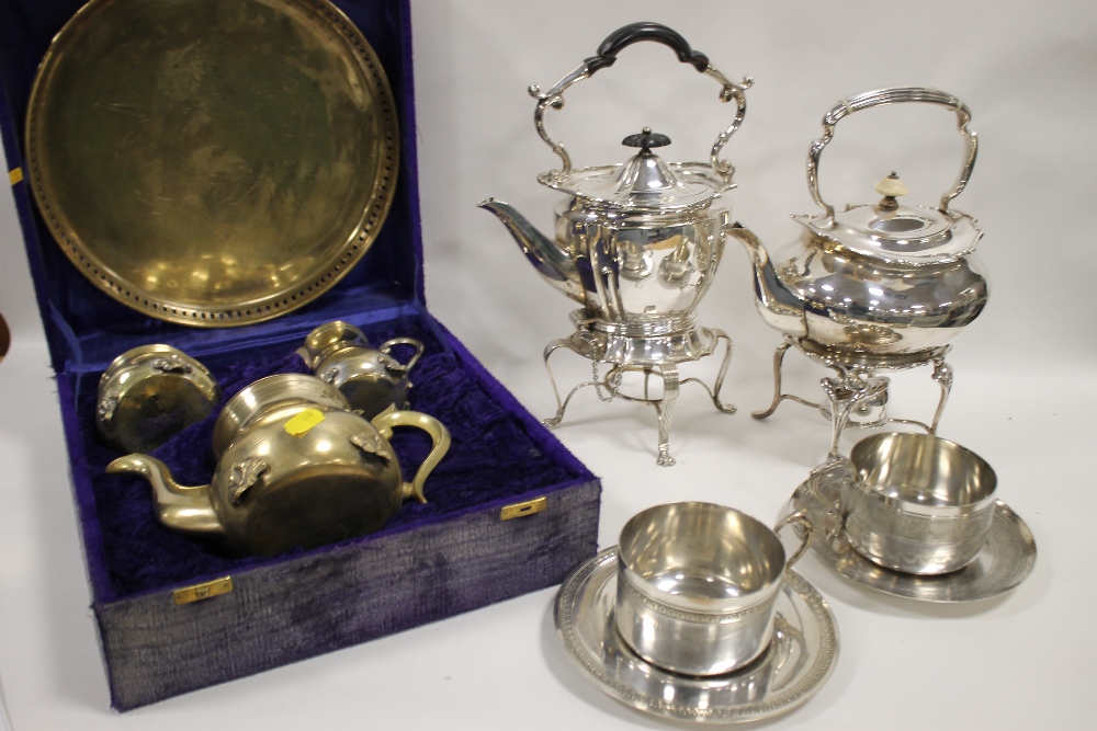 TWO SILVER PLATED SPIRIT KETTLES A/F TOGETHER WITH TWO FRENCH WHITE METAL CUPS AND SAUCERS AND A