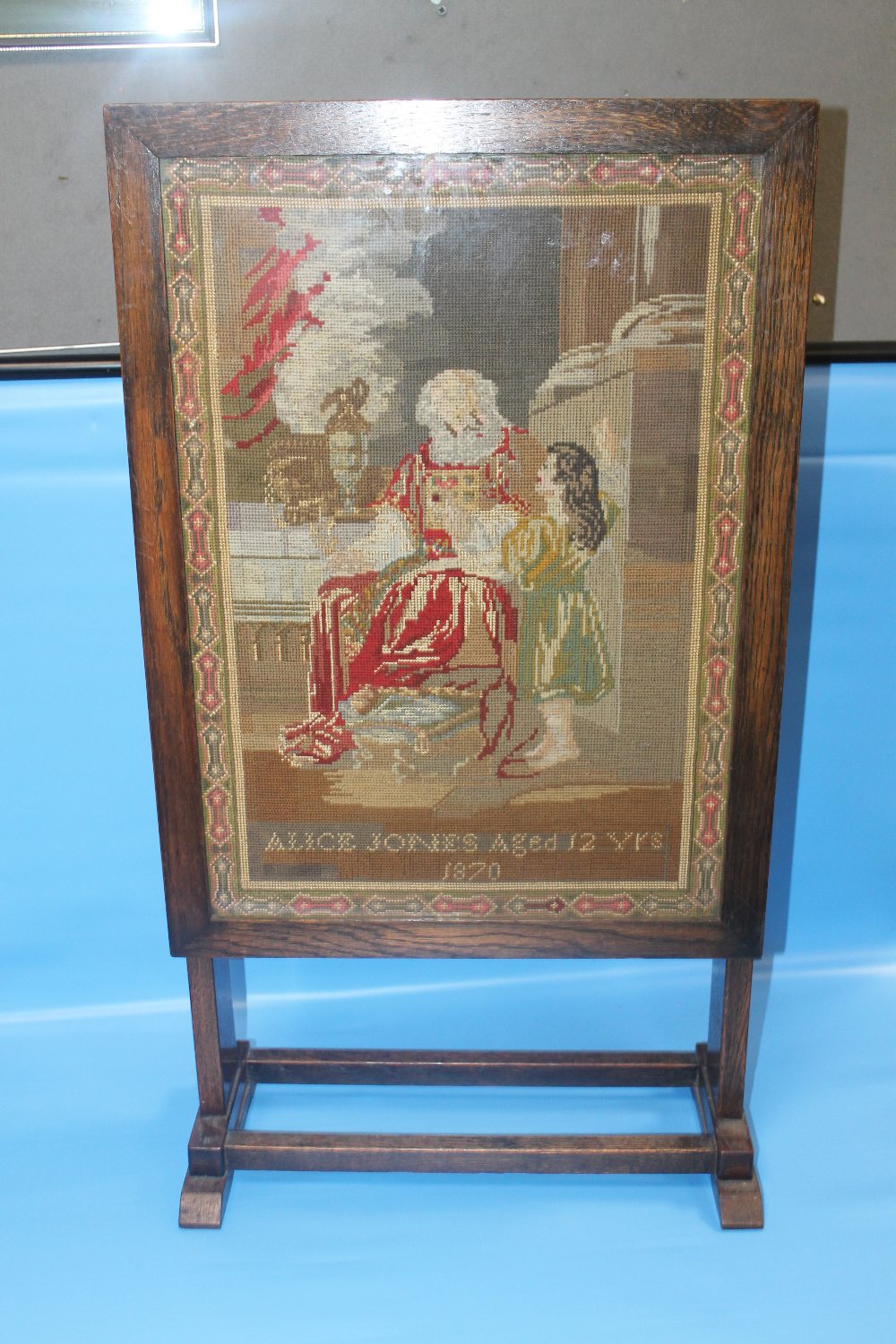 A OAK FRAMED TAPESTRY FIRE SCREEN