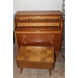 A TEAK ROLL TOP BUREAU TOGETHER A WITH SEWING TABLE