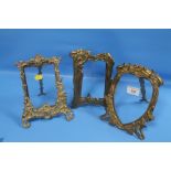 THREE BRASS PICTURE FRAMES