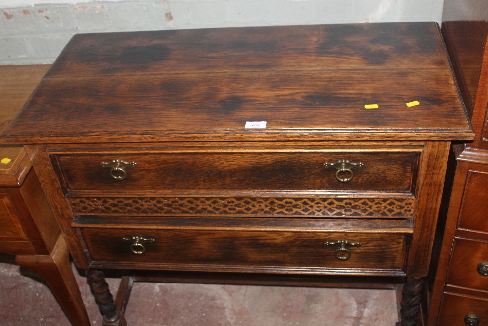 AN OAK TWO DRAW SIDEBOARD