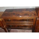 AN OAK TWO DRAW SIDEBOARD