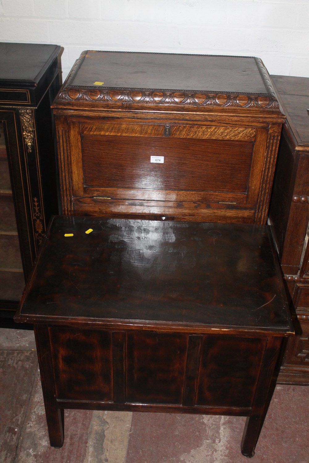 AN OAK CABINET TOGETHER WITH A SMALL STORAGE BOX