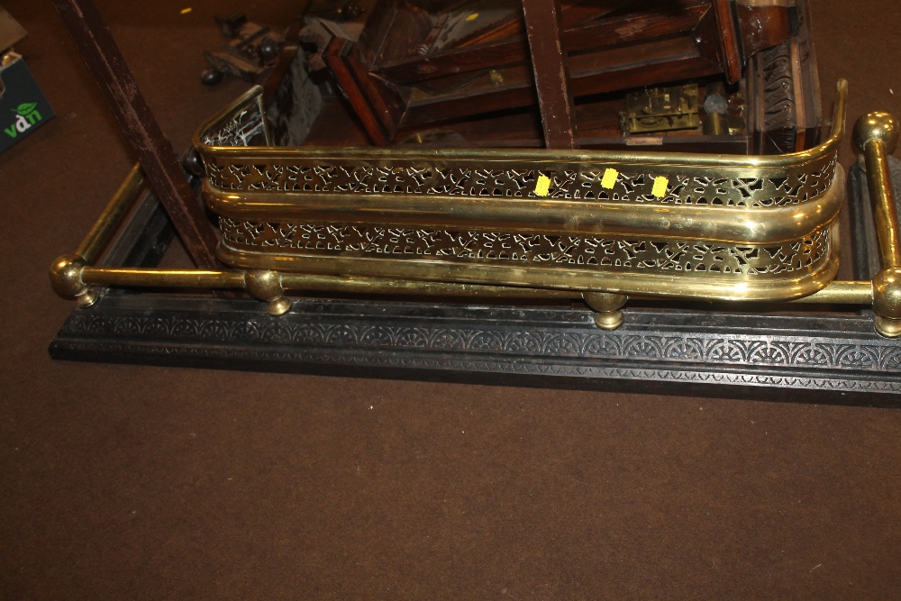 A CAST AND BRASS FENDER