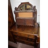 AN OAK DRESSING TABLE TOGETHER WITH A SMALL HANGING CUPBOARD