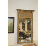 A LARGE OVERMANTEL MIRROR