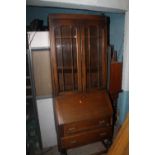 AN OAK BUREAU BOOK CASE