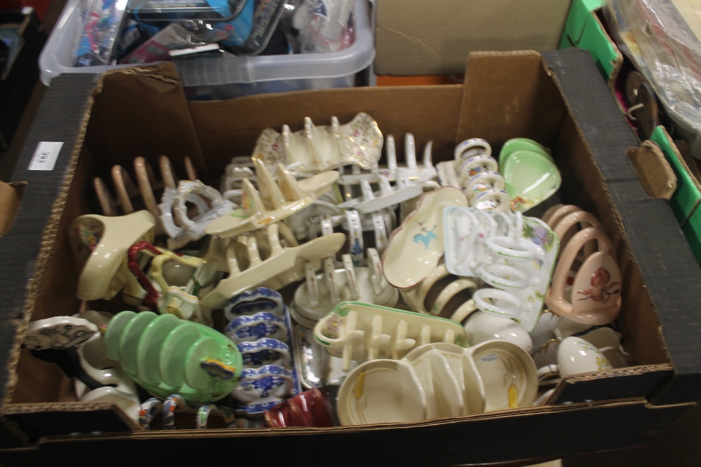 A BOX OF ASSORTED TOAST RACKS