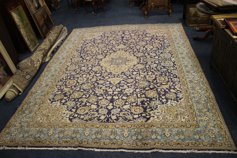 A LARGE 20TH CENTURY IRANIAN WOOLLEN RUG, with an all over pattern on a mainly blue ground, 373 x - Image 4 of 4