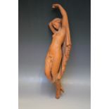 ARNOLD MACHIN (1911-1999). A terracotta figure, modelled a s a semi clad maiden, H 54 cm S/D