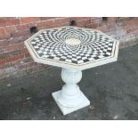 A 19TH CENTURY MARBLE SPECIMEN TABLE, the octagonal top inlaid with an unusual concentric pattern,