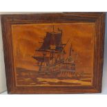 A 20TH CENTURY ARTS & CRAFTS STYLE INLAID SPECIMEN WOOD PANEL, depicting a galleon at sea, unframed,