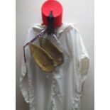 VINTAGE COSTUME - A MOROCCAN DJELLABA, together with a traditional Arab red fez hat and soft