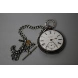 A HALLMARKED SILVER OPEN FACED MANUAL WIND POCKET WATCH, on plated chain, Dia 5.25 cm