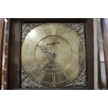 A 19TH CENTURY OAK AND MAHOGANY CROSSBANDED BRASS FACED LONGCASE CLOCK BY HARRIS OF WELLINGTON,