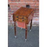 A WILLIAM IV ROSEWOOD WORK TABLE, with two drawers and pull-out material lined compartment, raised