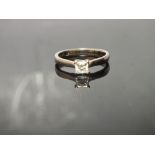 AN 18 CARAT WHITE GOLD PRINCESS CUT DIAMOND SOLITAIRE RING, the diamond being approx 0.40 carat,