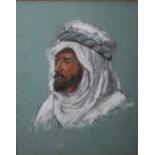 P. C. S. A head and shoulder portrait study of an Arab, signed with initials and dated 1914,