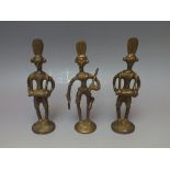 A SET OF THREE BENIN STYLE CAST METAL TRIBAL FIGURES, tallest H 17 cm