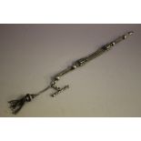 A VICTORIAN FANCY LINK ALBERTINA CHAIN, with t-bar and tassel embellishment, overall L 25 cm
