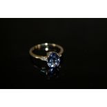 A HALLMARKED 14K GOLD AAA TANZANITE AND DIAMOND RING, the tanzanite being approx 2.6 carats,