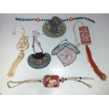 A COLLECTION OF CHINESE EMBROIDERED SILK POUCHES/ PURSE ETC., to include a archers thumb guard